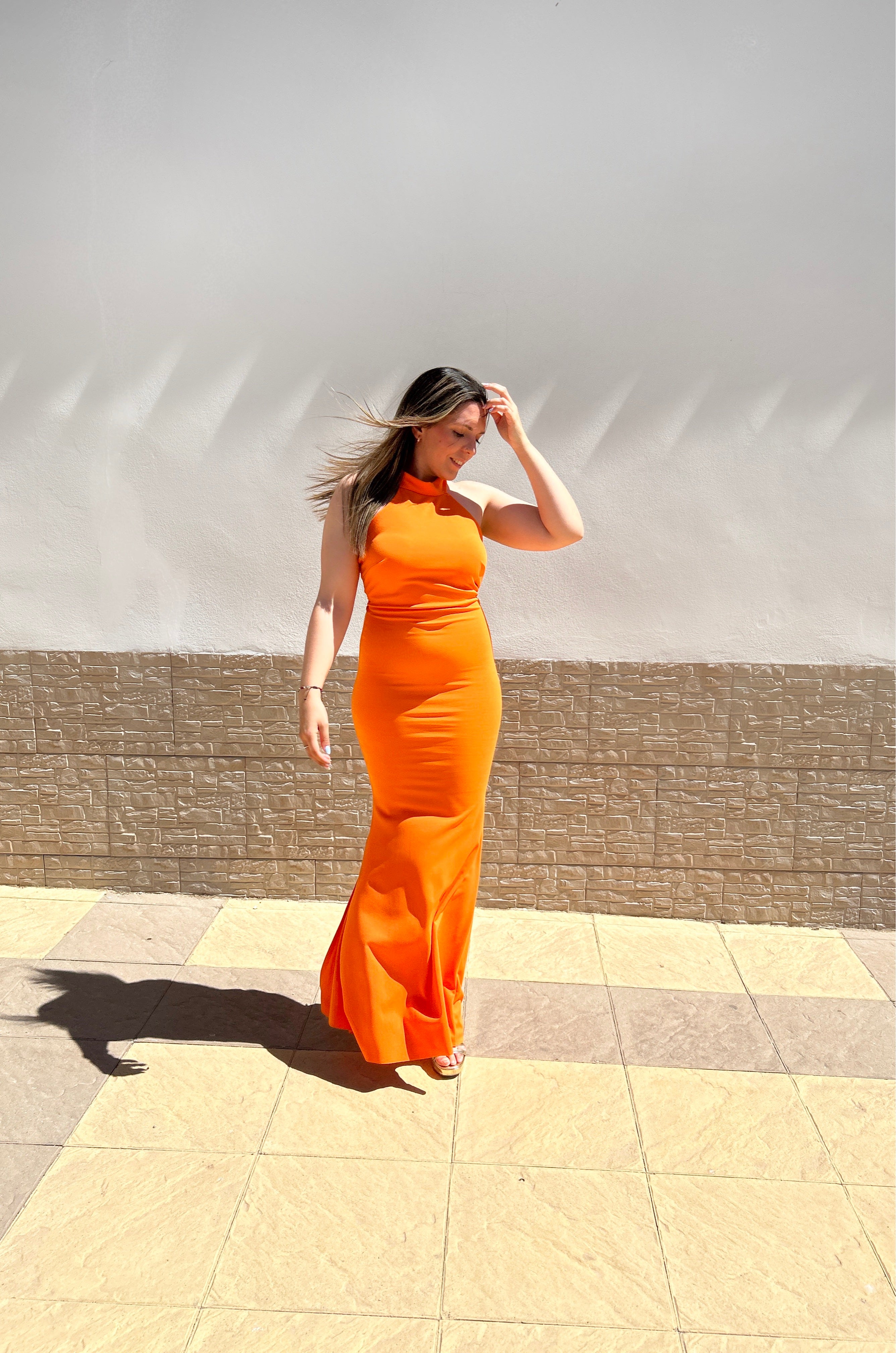 Orange knot back halter dress