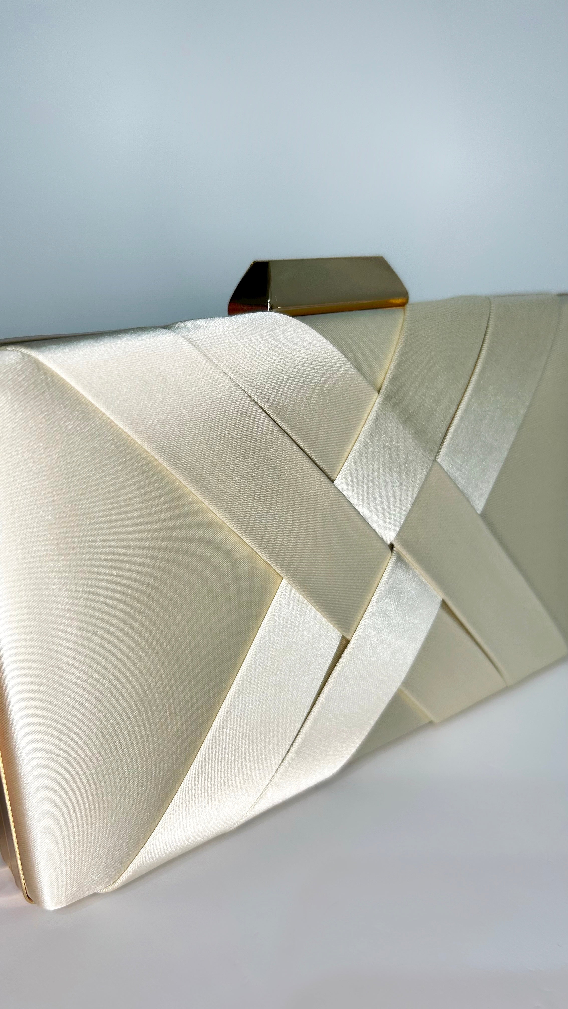 Gold interlaced satin clutch