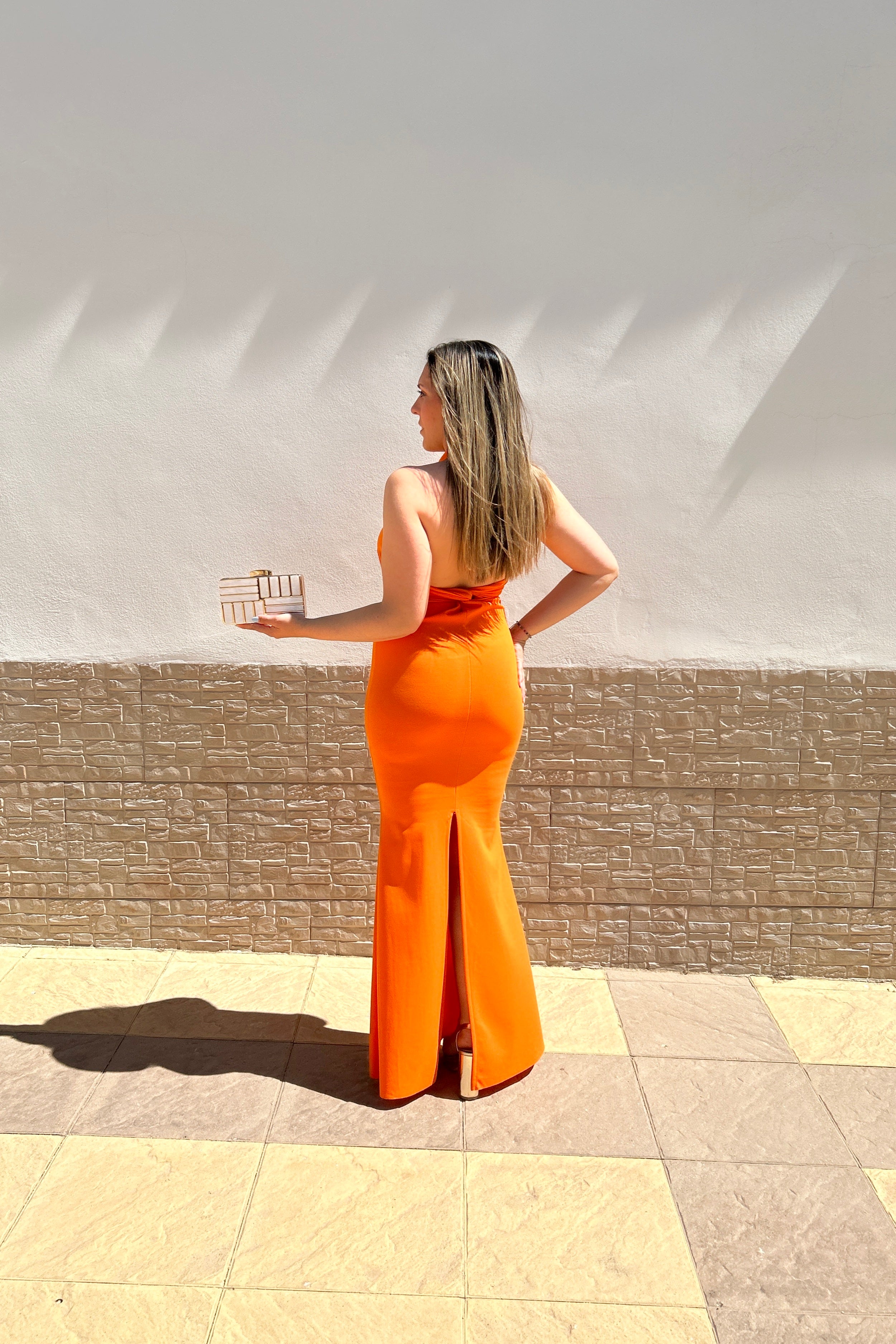 Orange knot back halter dress