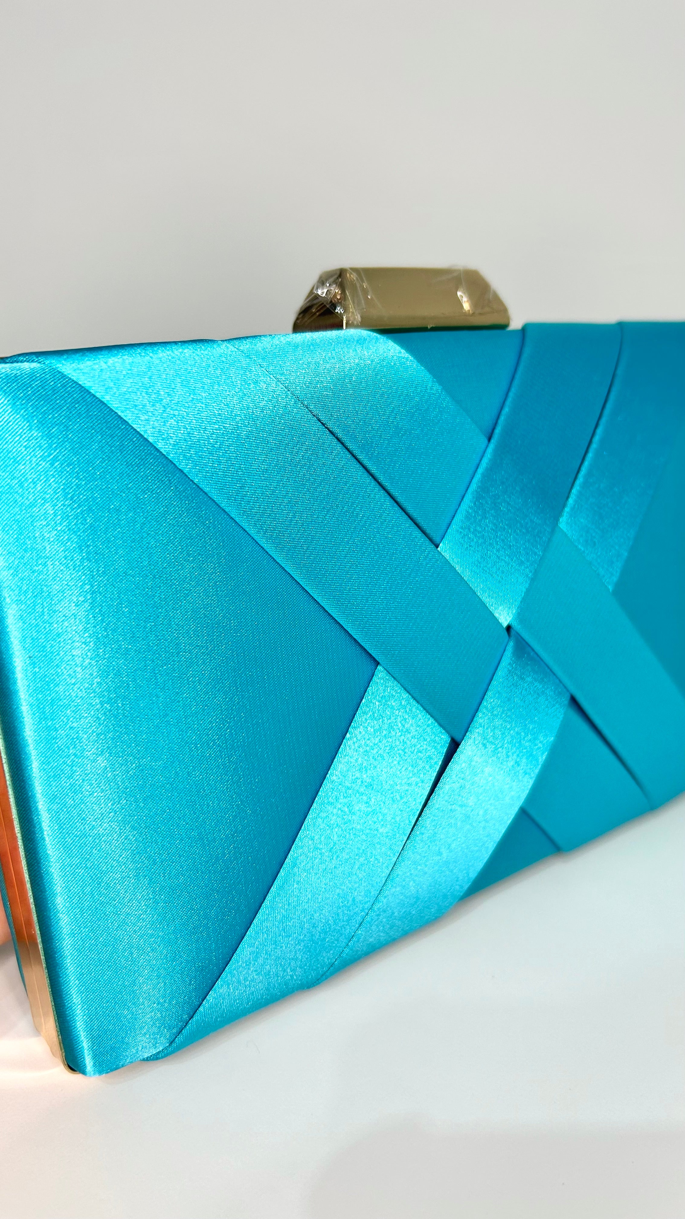 Blue interlaced satin clutch